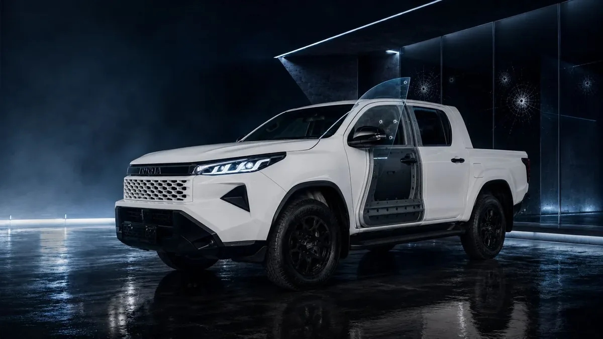 White Toyota Hilux armoured vehicle at Apex Motor Group